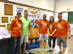 Mortgage Team Posing for a Photo at the Battle of the Builders Event