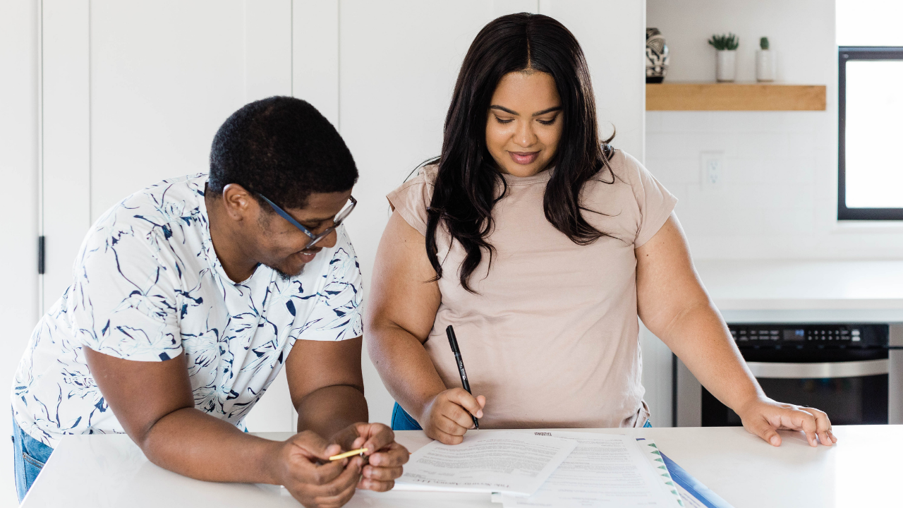 Couple looking at paperwork